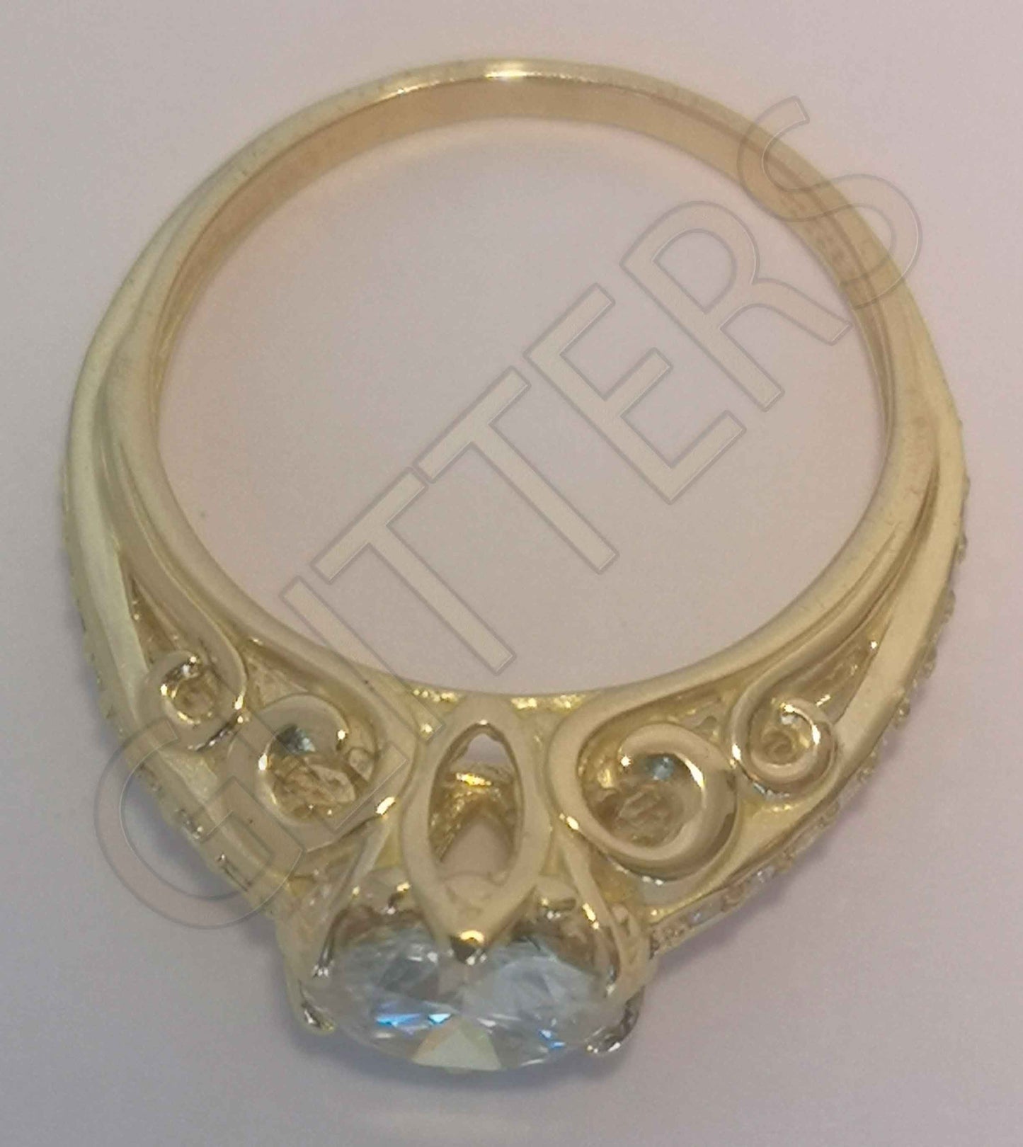 18kt yellow gold moissanite solitaire                    Weight: 4.20g